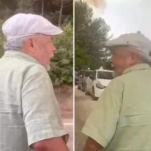 Yanginin ortasinda gozyaslari icinde esini aradi
