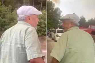 Yanginin ortasinda gozyaslari icinde esini aradi