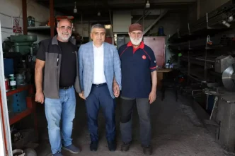 Merzifon Kaymakami Karaaslan sehit ailesi ve gazi ile esnafi ziyaret